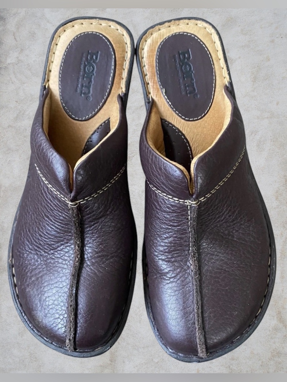 BORN Size 6 slip on, split toe clogs in a dark brown, pebbled leather.